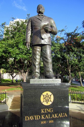 Stately bronze statue of King David Kalakaua.