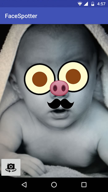 Augmented reality at work - cartoon faced baby