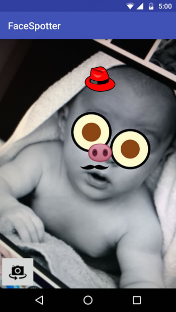 augmented reality - baby with a hat, googly eyes and a moustache